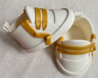 White fondant shoes with gold laces