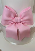 Big light pink or white fondant bow