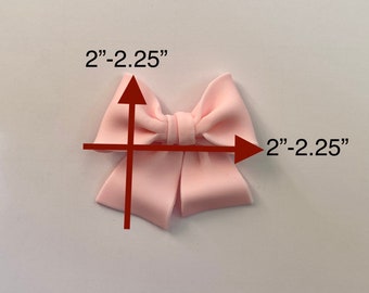 1 light pink bow cupcake topper.