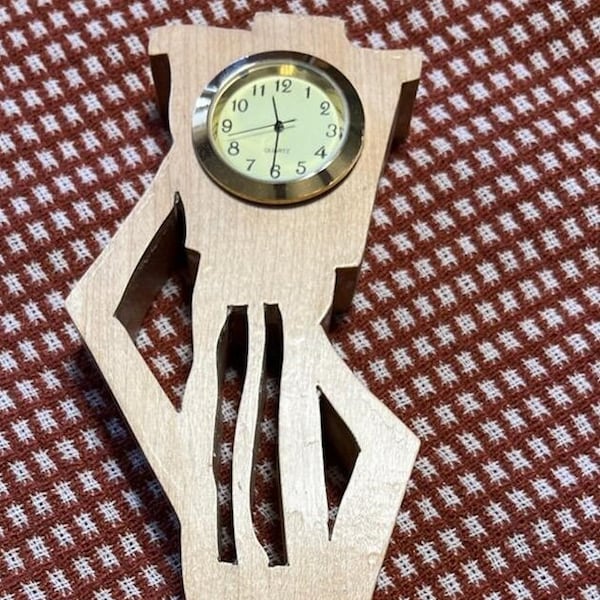 Hand Cut Dancing Clock