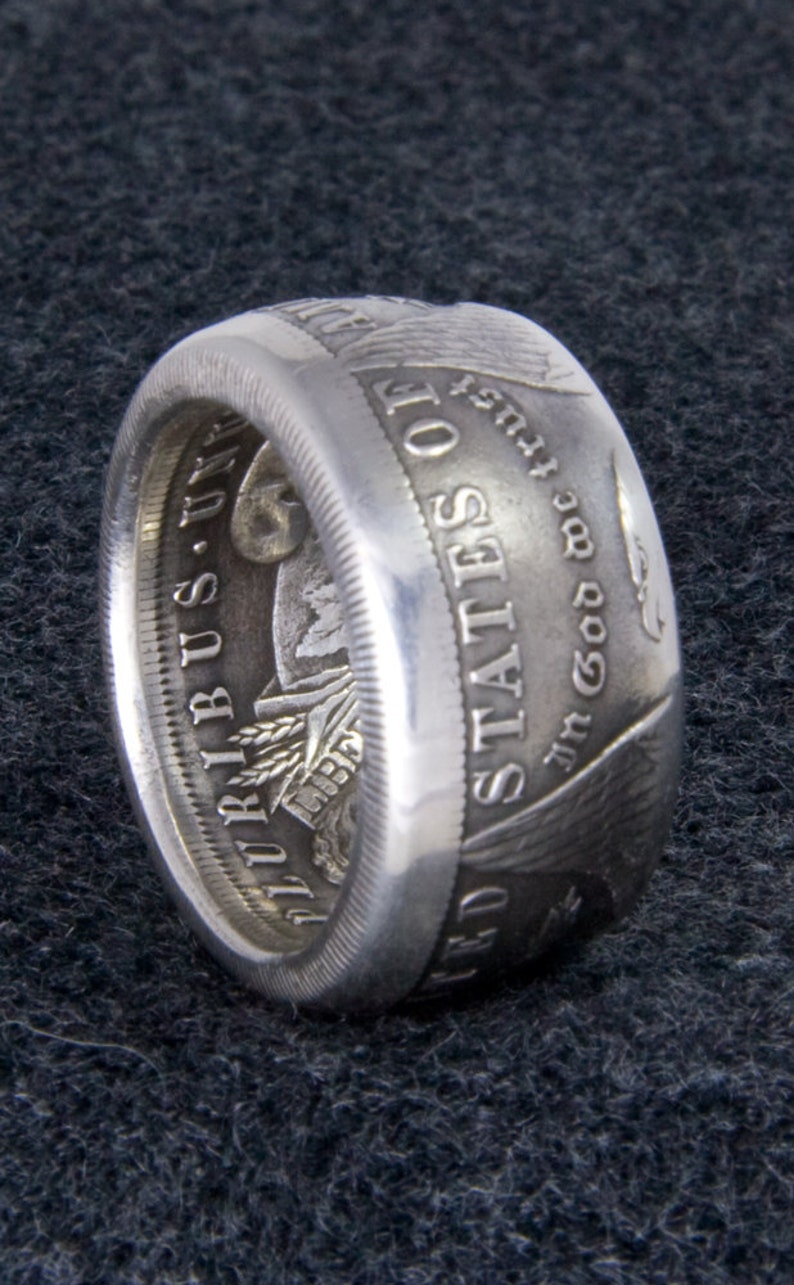 symbolism of a double sided coin