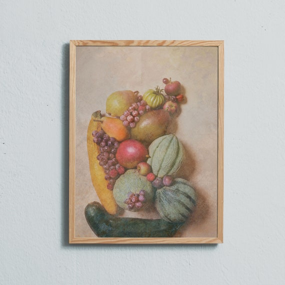 Grapes, raspberries, cantaloupe melons, a yellow and a green zucchini, pears, a mango, a green tomato, apples and a plum.