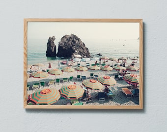 Photography art print of the parasols on the beach of Cinque Terre, Italy. Printed on matte paper of fine art quality.