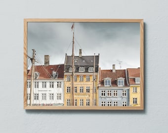 Photography print of old, colourful buildings in Nyhavn in Copenhagen. Printed on matte paper of fine art quality.