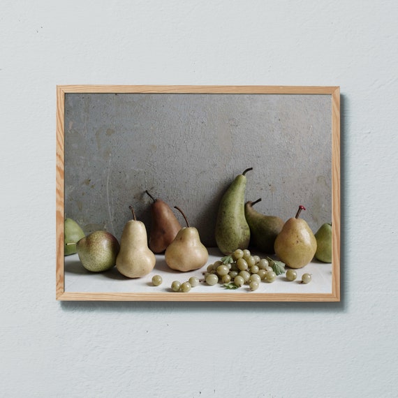 Grey, green and brown pears and gooseberries.