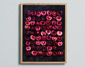 Moody art photography print of a red and pink cherrie still-life. Printed on matte paper of fine art quality.