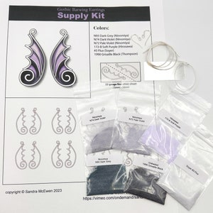 May include: A gothic batwing earring kit with instructions, silver earring wires, and small bags of purple, black, and white mica powder. The kit includes the text "Gothic Batwing Earrings Supply Kit" and "copyright © Sandra McEwen 2023".