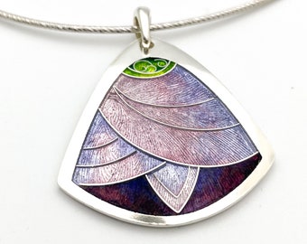May include: A silver pendant necklace with a triangular shaped pendant featuring a purple and green enamel design.