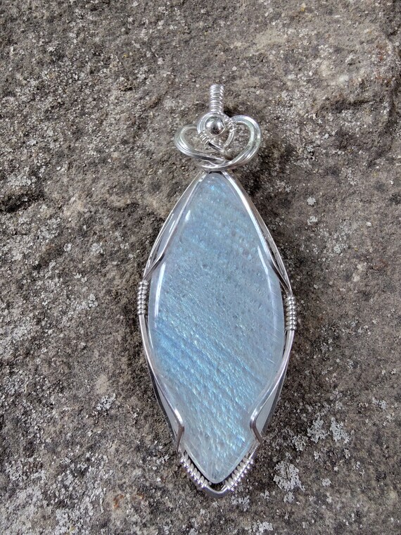 Rainbow Moonstone Artistically Wrapped In Sterling Silver. Statement Pendant