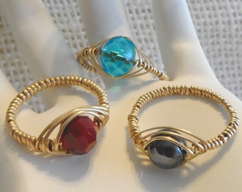 14k yellow gold filled wire wrapped bead rings made to order with a variety of bead colors and ring sizes.