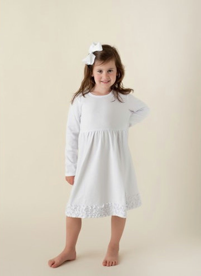 white long sleeve ruffle dress