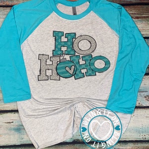 Ho Ho Ho Christmas design on Next Level baseball tee- Tahiti Blue sleeves