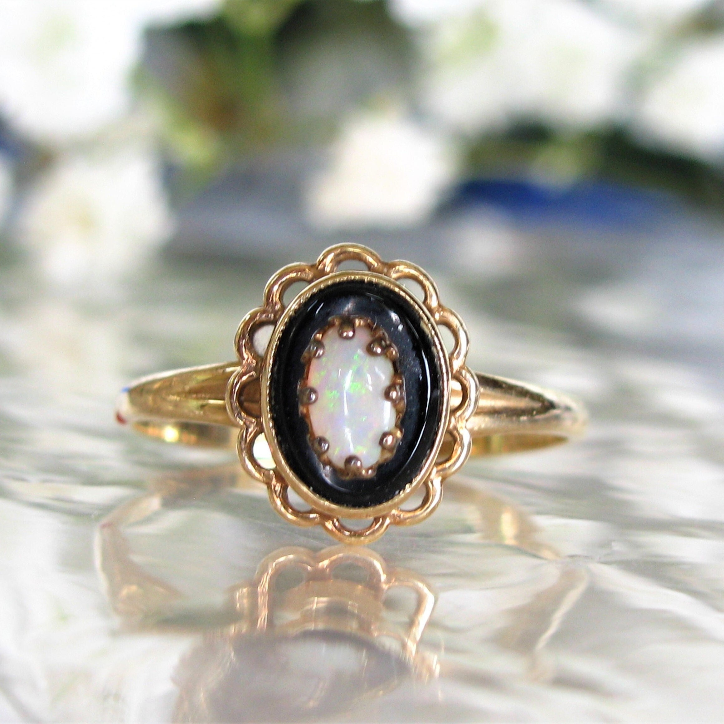 Black Crystal Opal Solitaire Ring in Yellow Gold Bezel