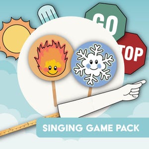 Pode incluir: Um conjunto de peças de jogo ilustradas, incluindo um sol, um floco de neve e uma chama, juntamente com sinais de stop e go. O texto "SINGING GAME PACK" é exibido na parte inferior da imagem, adequado para jogos educativos.