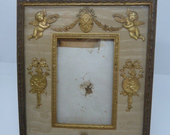 Antique 1900 French Gilt Bronze Easel Ribbon Bow Picture Frame, Cherub Mounts, Retailed by Stern Brothers New York, Damaged Back