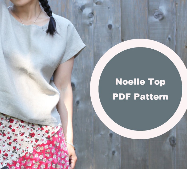 May include: A light beige linen top with short sleeves. The top is paired with a floral print skirt. A circular graphic with the text "Noelle Top PDF Pattern" is on the right side of the image.