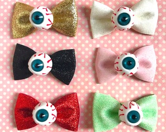 Super glittery eyeball hair bows in red gold black pink green or white