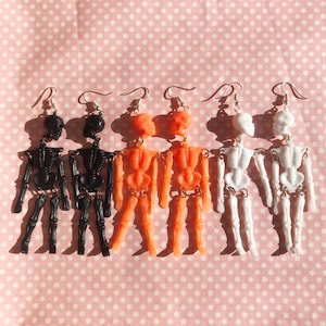 Wiggly Skeleton earrings in black orange or white hooks stud or clip on