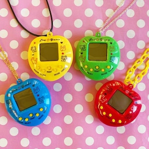 Cute pet game necklace or keychain in pink red yellow blue or green