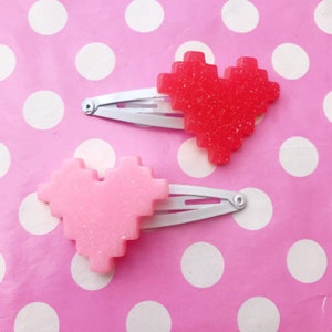 Pixel heart glitter hair clip in red or pastel pink