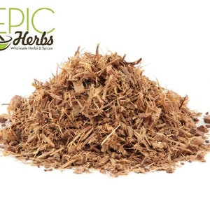 May include: A pile of dried, shredded, brown liquorice root. The root is a natural ingredient used in herbal remedies and teas.
