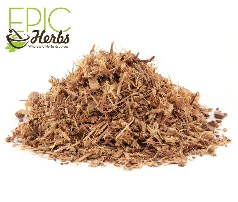 May include: A pile of dried, shredded, brown liquorice root. The root is a natural ingredient used in herbal remedies and teas.