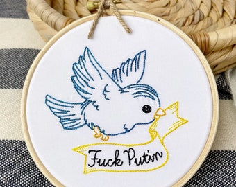 Fuck Putin Subversive Needlepoint. Finished & framed leftist embroidery hoop art that says 'I stand with Ukraine' with some profanity.