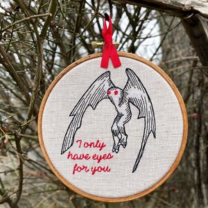 Mothman Valentine Gift: Embroidery Art with the words "I only have eyes for you" stitched in red & black.