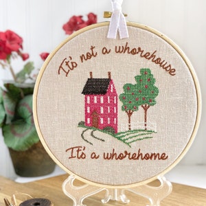It's not a whore house, its a whore home: Subversive cross stitch completed & framed. Unique funny needlepoint sign for snarky welcome sign.