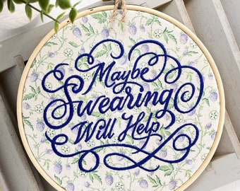 Maybe Swearing Will Help: Completed funny embroidery hoop art. Framed and finished subversive cross stitch decor with cottagecore aesthetic