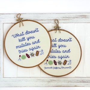 What doesn't kill you mutates and tries again: Framed Embroidery Art. Nerdy Cross Stitch Finished. Funny Science Gift for Her Microbiologist