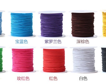 May include: Ten spools of elastic cord in various colors, including light blue, blue, purple, brown, yellow, green, pink, red, white, and black. Each spool is labeled with the color name in Chinese characters.