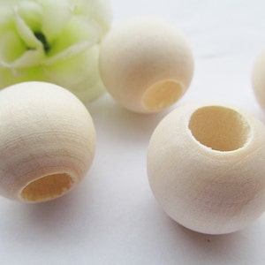 Gute Qualität 25mm unvollendeter Round Ball Natural Wood Spacer Perlen Charm Finding, Big Hole Middle, DIY Accessory Jewellry Making