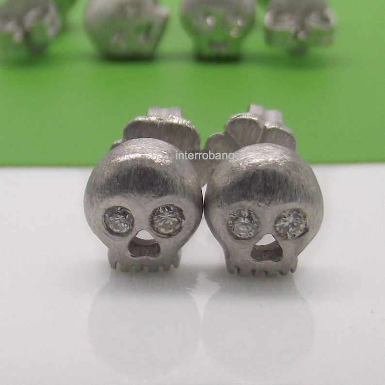 Men's stud earrings antarctic diamond skull stud image 0