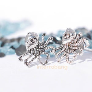 Cute octopus stud earrings made of  sterling silver plated in white gold, ocean, sealife, marine jewelry