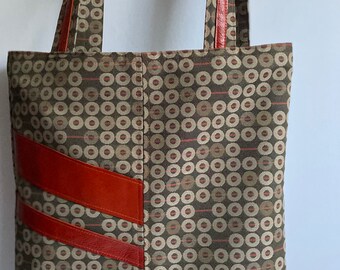 Tall pattern tote with brown leather accents