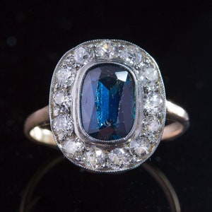 Art Deco Timeless Natural Sapphire and Diamond romantic Halo Ring