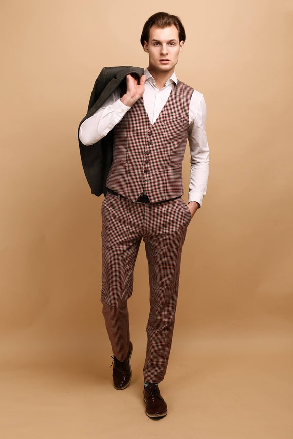brown vest and pants