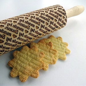Personalized Rolling Pin - made by......  Lazer engraved rolling pin for homemade embossed cookies. Diagonally engraved text made by