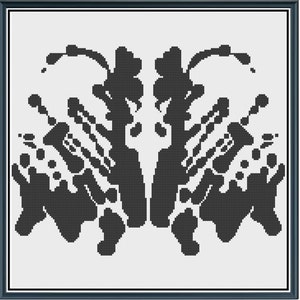 May include: Black and white inkblot image, a symmetrical design with abstract shapes and patterns. This is a Rorschach test image.