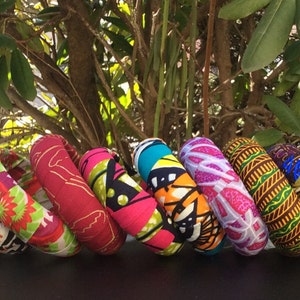THREE wood covered Ankara  Bangles