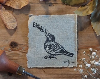 Miniature handmade lino print of a blah blah bird (Second Version)