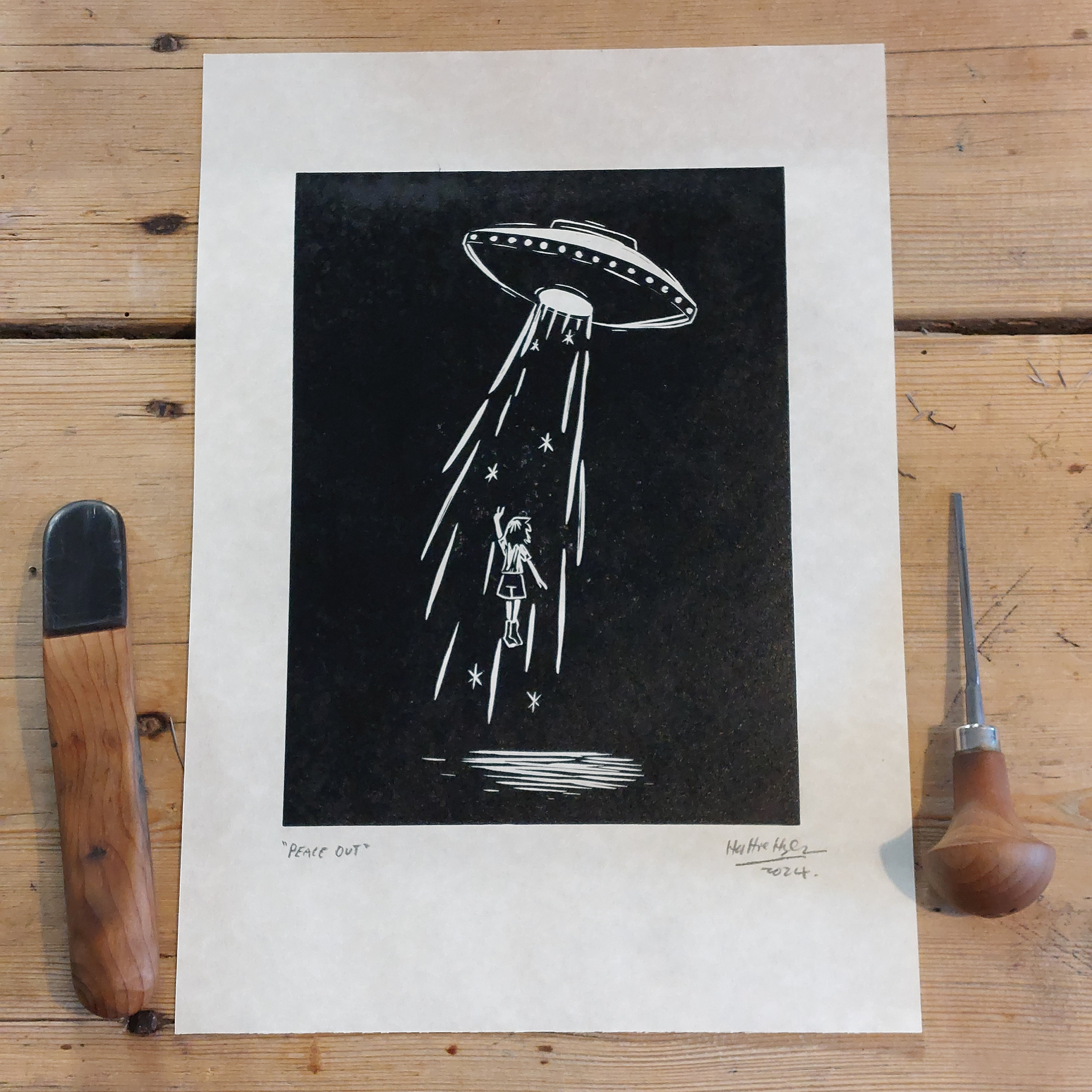 Handmade linocut print of a UFO alien abduction A4