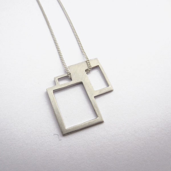 Modern silver pendant based on architectural floor plans - version 1