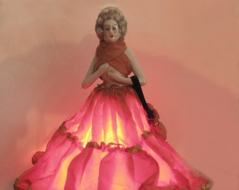 Vintage Porcelain Half Doll Lamp of Victorian Lady Dressed in a Ruffled Orange Dress with Ric Rac Trim
