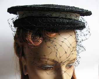 Woman"s Black Straw Sailor Hat adorned with White Grosgrain Ribbon 1940s