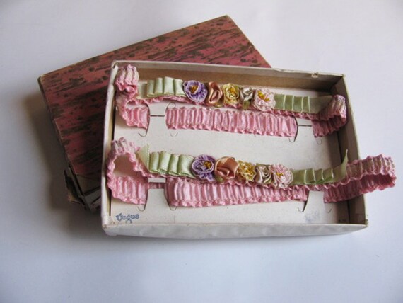 Vogue pair of ribbon work garters