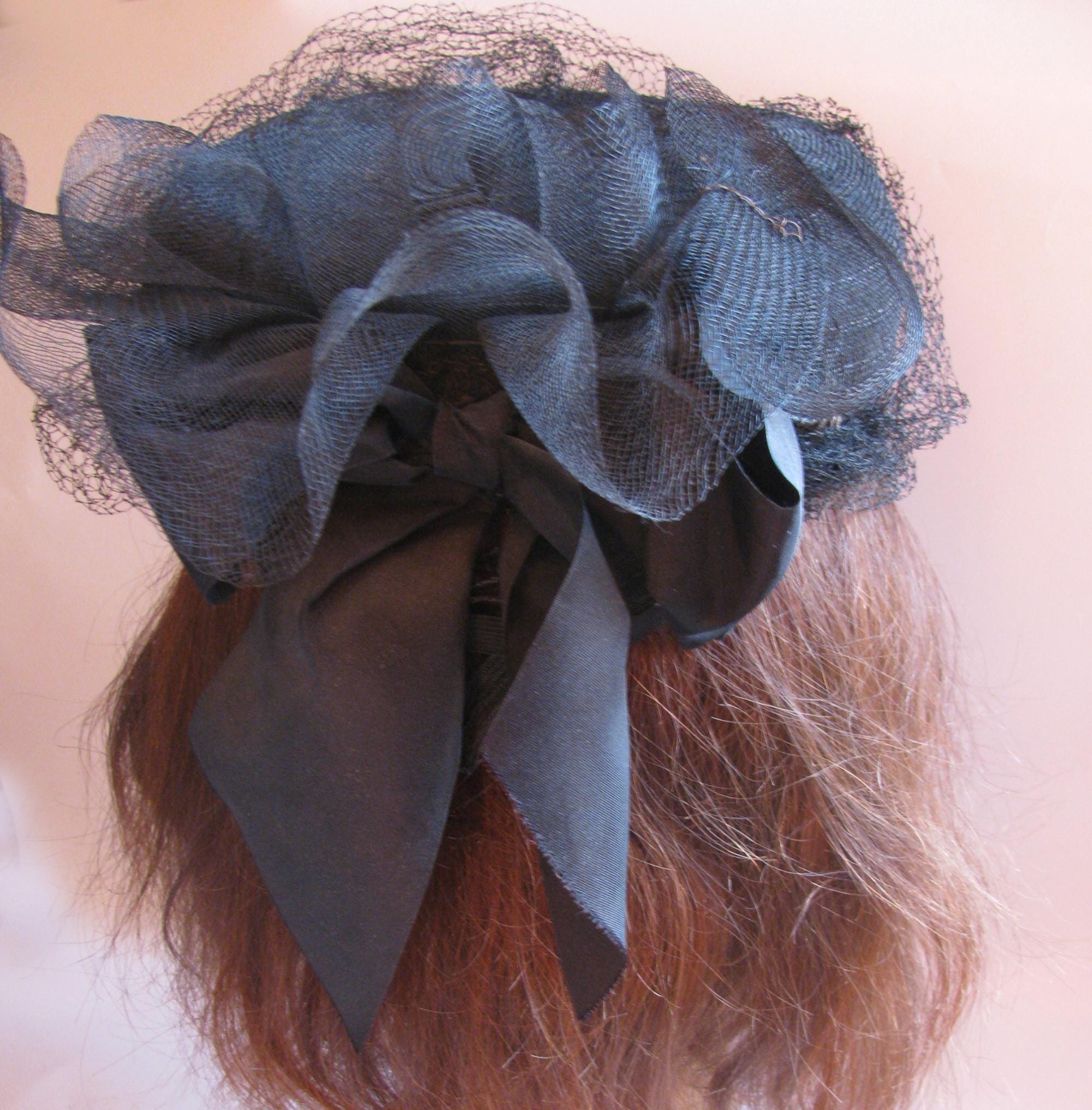 Black Vintage 1940s Hat With Netting and Large Black Bow in  display picture 1