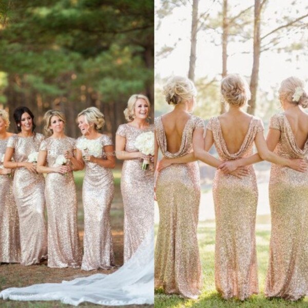 Catherine's bridesmaids - full length light champagne sequin boat neck cowl back gowns.