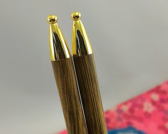 Coffee Golden Capped Chopsticks. Decorated Chinese wooden chopstick with fancy golden cap. Asian wedding!